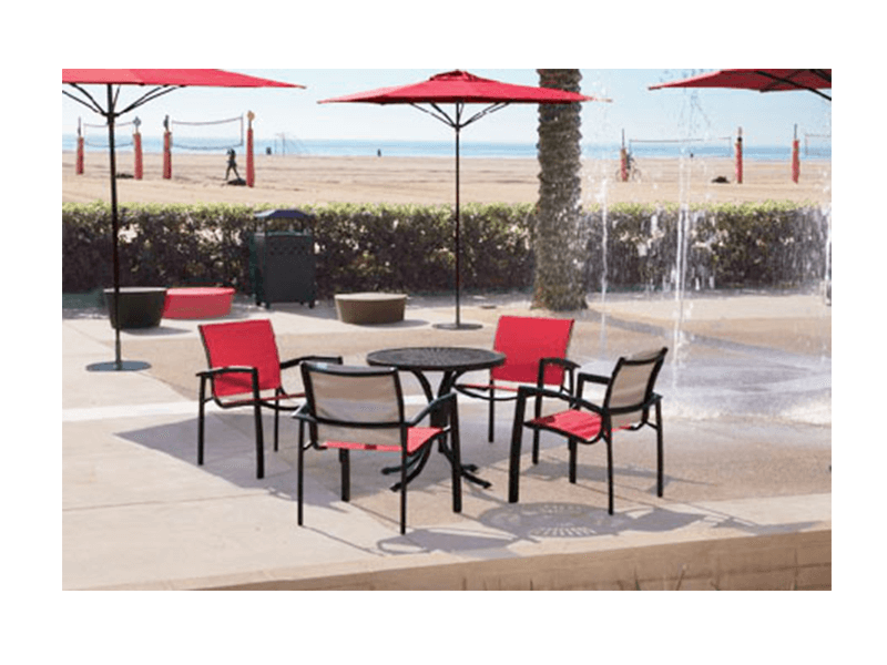 Tropitone chairs and tables with red fabric