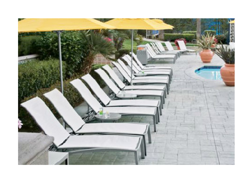Tropitone Chaise Lounges on hotel patio