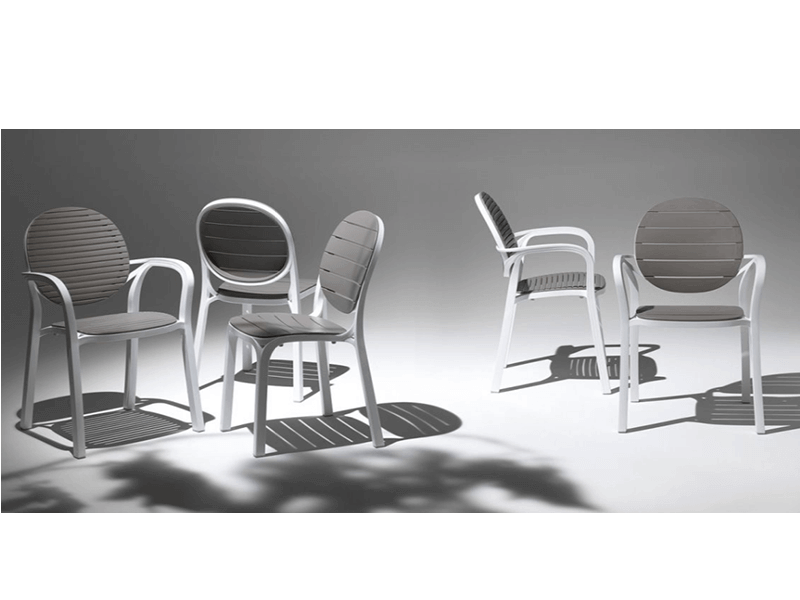multiple Nardi dining chairs