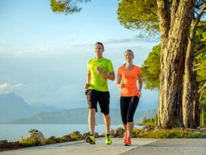 Man and Woman power walking